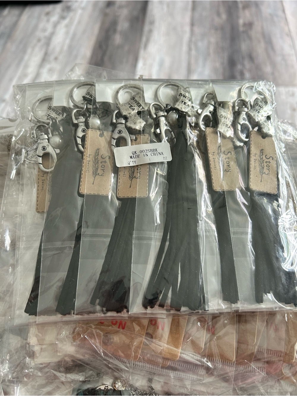 4/$50 Black Leather Tassel Keychain with Silver Hardware